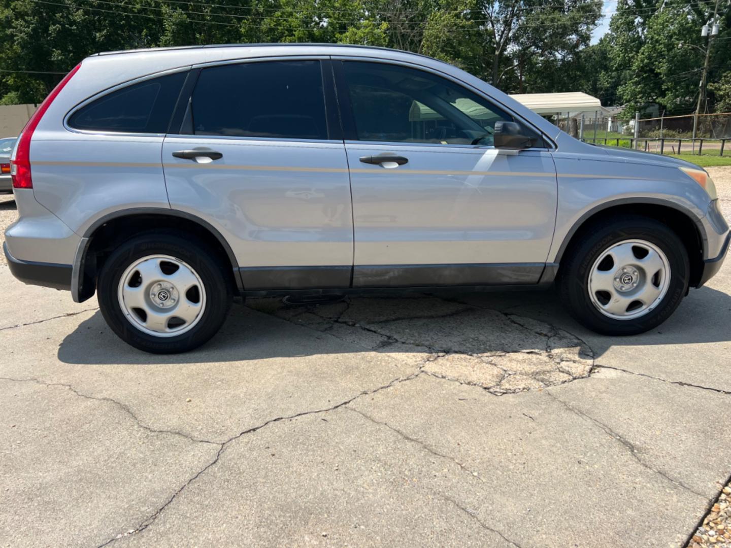 2008 Gray /Gray Honda CR-V LX (3CZRE383X8G) with an 2.4L 4 Cylinder engine, Automatic transmission, located at 4520 Airline Hwy, Baton Rouge, LA, 70805, (225) 357-1497, 30.509325, -91.145432 - 2008 Honda CR-V LX 2.4L 4Cylinder Gas Saver, Automatic, 158K Miles, Power Windows & Locks, Cold A/C, No Accidents But It Does Have A Dent On Drivers Door. FOR INFO PLEASE CONTACT JEFF AT 225 357-1497 CHECK OUT OUR A+ RATING WITH THE BETTER BUSINESS BUREAU WE HAVE BEEN A FAMILY OWNED AND OPERATED BUS - Photo#4